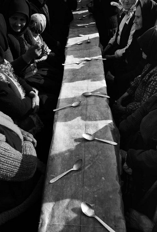 278 Nikos Economopoulos, Dinner held after a funeral, Maramures, Romania, 1990..jpg
