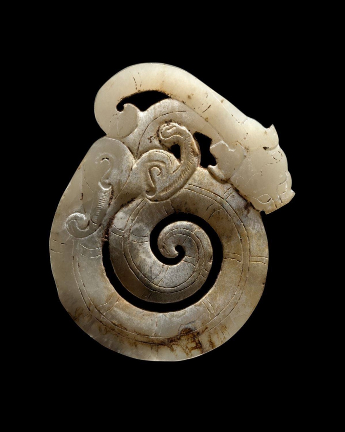 +2740b Han Dynasty, 220 BCE - 220 CE Ornament of a Coiled Feline Dragon.jpg